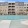 Pool with white chairs in the shallow end
